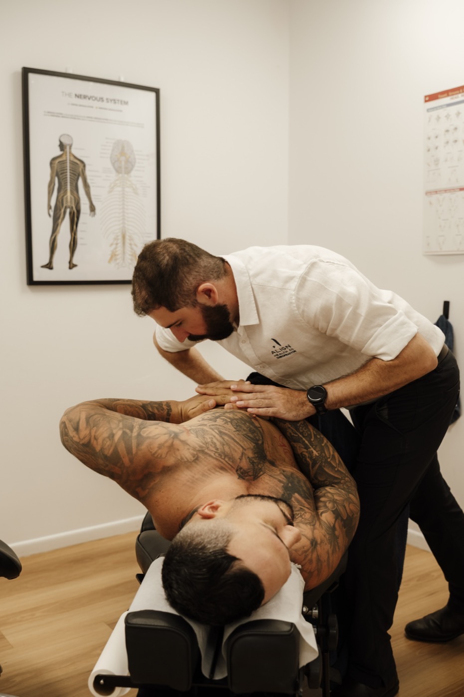 Chiropractor assessing a patient at Align Health Co Mackay